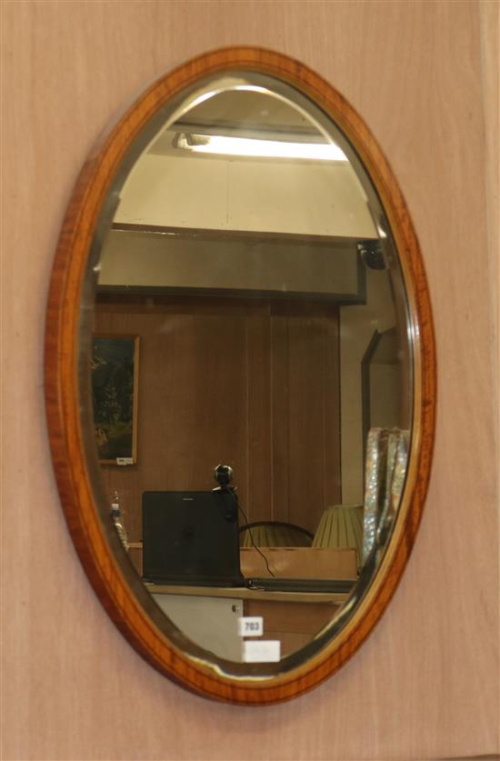 An inlaid satinwood oval wall mirror, H.84cm